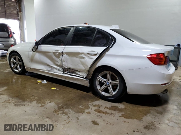 2013 BMW 3 Series 328i xDrive with VIN WBA3B3C51DJ811089, listed as a Copart auction lot 87579905 with 106,754 mi miles and Salvage title. Bid and sale history available at DreamBid. Image 2.