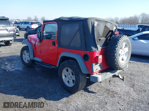 2005 Jeep Wrangler X with VIN 1J4FA39S95P385581, listed as a IAAI auction lot 41333338 with 150,010 mi miles and . Bid and sale history available at DreamBid. Image 3.