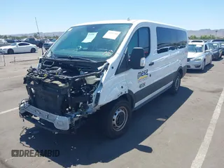 2020 Ford Transit Passenger XL with VIN 1FMZK1Y89LKB17761, listed as a IAAI auction lot 39455768 with 73,654 mi miles and . Bid and sale history available at DreamBid. Image 2.
