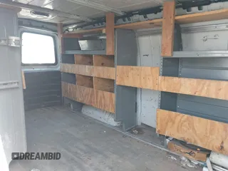 2013 Chevrolet Express Cargo with VIN 1GCWGGFA5D1117720, listed as a IAAI auction lot 41670878 with 224,650 mi miles and . Bid and sale history available at DreamBid. Image 8.
