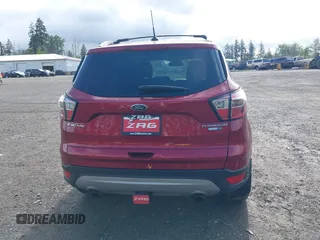 2018 Ford Escape Titanium with VIN 1FMCU9J99JUB44963, listed as a IAAI auction lot 42293113 with 68,803 mi miles and . Bid and sale history available at DreamBid. Image 17.