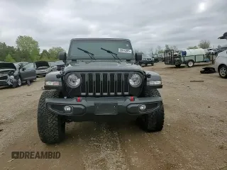 2021 Jeep Wrangler Unlimited Rubicon z VIN 1C4HJXFN1MW793064, wystawiony jako Copart lot #55643305 z przebiegiem 51 944 mil mil oraz Szkoda całkowita • Salvage title. Historia ofert i sprzedaży dostępna na DreamBid. Obrazek 13.