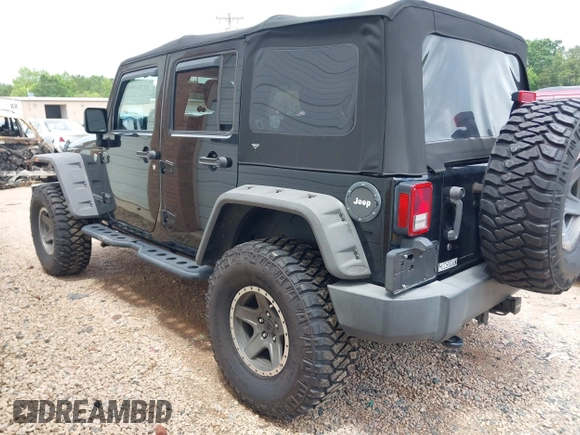 2015 Jeep Wrangler Unlimited Rubicon with VIN 1C4BJWFG4FL566862, listed as a IAAI auction lot 42310901 with 146,206 mi miles and . Bid and sale history available at DreamBid. Image 3.