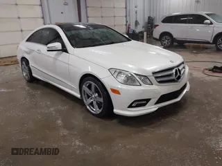 2011 Mercedes-Benz E-Class E 550 with VIN WDDKJ7CB4BF069405, listed as a IAAI auction lot 41567570 with 125,265 mi miles. Bid and sale history available at carsss.com. Image 1.