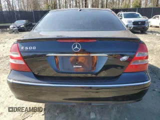 2003 Mercedes-Benz E-Class 5.0L with VIN WDBUF70J53A199951, listed as a Copart auction lot 51138595 with 129,414 mi miles and Salvage Title. Bid and sale history available at carsss.com. Image 6.