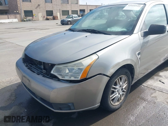 2008 Ford Focus SE with VIN 1FAHP33NX8W135881, listed as a IAAI auction lot 41668949 with 160,261 mi miles. Bid and sale history available at carsss.com. Image 6.