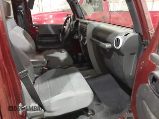 2008 Jeep Wrangler Unlimited Sahara z VIN 1J4GA59178L514002, wystawiony jako IAAI lot #41949717 z przebiegiem Nie podano mil oraz . Historia ofert i sprzedaży dostępna na DreamBid. Obrazek 5.