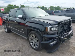 2018 GMC Sierra 1500 Denali z VIN 3GTU2PEJ6JG326310, wystawiony jako IAAI lot #42357048 z przebiegiem 119 825 mil mil oraz . Historia ofert i sprzedaży dostępna na DreamBid. Obrazek 1.