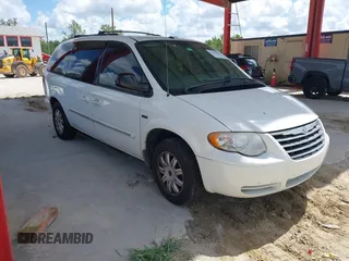 2007 Chrysler Town & Country Touring z VIN 2A4GP54L47R274792, wystawiony jako IAAI lot #42523960 z przebiegiem 69 081 mil mil oraz . Historia ofert i sprzedaży dostępna na DreamBid. Obrazek 1.