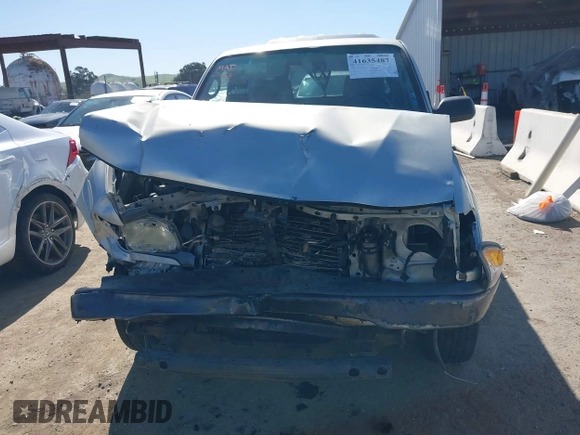 2003 Toyota Tacoma with VIN 5TENL42N83Z301987, listed as a IAAI auction lot 41635487 with 174,911 mi miles and . Bid and sale history available at DreamBid. Image 13.