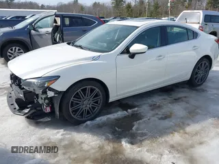 2016 Mazda 6 i Grand Touring с VIN JM1GJ1W55G1468475, выставлен на аукционе IAAI как лот 41651004 с пробегом 31 332 миль миль и . История ставок и продаж доступна на DreamBid. Изображение 2.