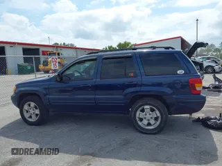 2001 Jeep Grand Cherokee Limited with VIN 1J4GX58S01C657436, listed as a IAAI auction lot 42102133 with 194,897 mi miles and . Bid and sale history available at DreamBid. Image 13.