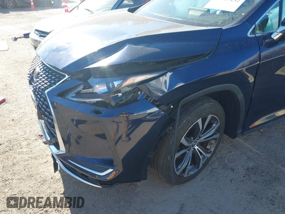 2022 Lexus RX with VIN JTJHGKFAXN2023336, listed as a IAAI auction lot 40967132 with 27,947 mi miles. Bid and sale history available at carsss.com. Image 17.