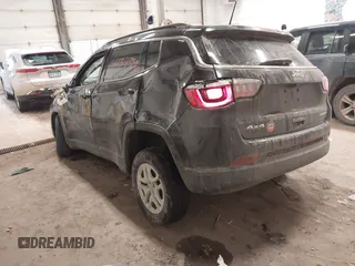 2021 Jeep Compass Sport with VIN 3C4NJDAB2MT584484, listed as a IAAI auction lot 41337382 with 96,940 mi miles and . Bid and sale history available at DreamBid. Image 3.