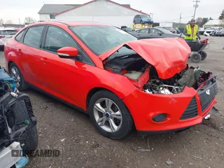 2014 Ford Focus SE with VIN 1FADP3F20EL379178, listed as a IAAI auction lot 42027323 with 142,872 mi miles. Bid and sale history available at carsss.com. Image 1.