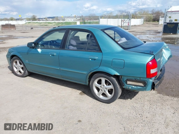 2002 Mazda Protege DX z VIN JM1BJ225721591435, wystawiony jako IAAI lot #42117544 z przebiegiem 191 185 mil mil oraz . Historia ofert i sprzedaży dostępna na DreamBid. Obrazek 3.