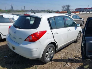 2012 Nissan Versa S with VIN 3N1BC1CPXCK212600, listed as a IAAI auction lot 41918424 with 104,483 mi miles. Bid and sale history available at carsss.com. Image 4.