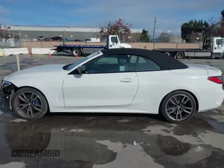 2022 BMW 4 Series M440i with VIN WBA53AT02NCJ20674, listed as a IAAI auction lot 41200398 with 28,235 mi miles and . Bid and sale history available at DreamBid. Image 15.