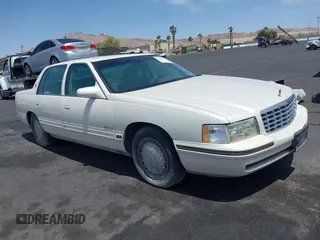 1999 Cadillac DeVille DHS z VIN 1G6KE54Y3XU714363, wystawiony jako IAAI lot #42257217 z przebiegiem 287 542 mil mil oraz . Historia ofert i sprzedaży dostępna na DreamBid. Obrazek 1.