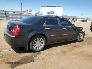 2005 Chrysler 300 with VIN 2C3AA63H35H518844, listed as a Copart auction lot 52188995 with 201,445 mi miles and Salvage Title. Bid and sale history available at carsss.com. Image 3.