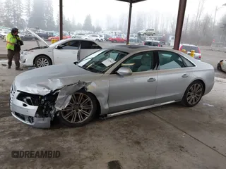 2013 Audi A8 4.0L с VIN WAUA2AFD5DN017770, выставлен на аукционе IAAI как лот 41255625 с пробегом 115 993 миль миль и . История ставок и продаж доступна на DreamBid. Изображение 14.