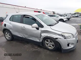 2015 Chevrolet Trax LS with VIN 3GNCJPSBXFL256473, listed as a IAAI auction lot 41130809 with 106,923 mi miles and . Bid and sale history available at DreamBid. Image 6.