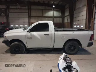 2014 Ram 1500 Express with VIN 3C6JR6AG7EG310097, listed as a IAAI auction lot 41409343 with 134,140 mi miles and . Bid and sale history available at DreamBid. Image 14.
