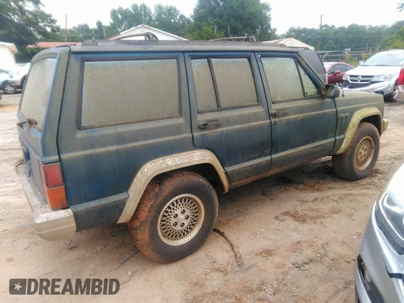 1993 Jeep Cherokee Country with VIN 1J4FJ78S0PL519025, listed as a IAAI auction lot 42409707 with 162,231 mi miles and . Bid and sale history available at DreamBid. Image 4.
