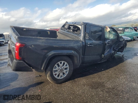 2025 Toyota Tacoma SR with VIN 3TMLB5JN1SM109033, listed as a Copart auction lot 49239575 with Not Provided miles and Salvage Title. Bid and sale history available at DreamBid. Image 3.