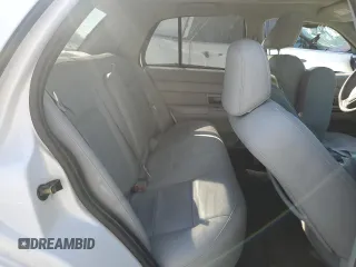 2004 Ford Crown Victoria LX z VIN 2FDFP74W34X164453, wystawiony jako Copart lot #75922204 z przebiegiem 103 546 mil mil oraz Szkoda całkowita • Salvage title. Historia ofert i sprzedaży dostępna na DreamBid. Obrazek 10.