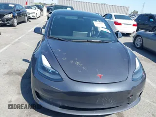 2023 Tesla Model 3 z VIN 5YJ3E1EA5PF401299, wystawiony jako IAAI lot #41968352 z przebiegiem 20 541 mil mil oraz . Historia ofert i sprzedaży dostępna na DreamBid. Obrazek 13.
