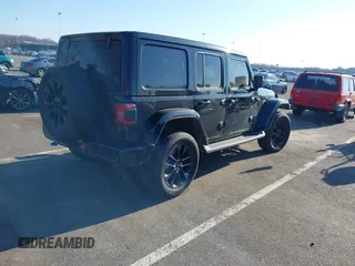 2021 Jeep Wrangler Unlimited Sahara with VIN 1C4JJXP62MW826470, listed as a IAAI auction lot 41651709 with 44,677 mi miles and . Bid and sale history available at carsss.com. Image 4.