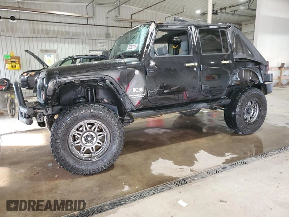 2008 Jeep Wrangler Unlimited X с VIN 1J4GA39128L632897, выставлен на аукционе Copart как лот 55282115 с пробегом 167 844 миль миль и Списание • Salvage title. История ставок и продаж доступна на DreamBid. Изображение 1.