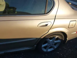 2003 Nissan Maxima SE z VIN JN1DA31D83T502519, wystawiony jako IAAI lot #41104746 z przebiegiem Nie podano mil oraz . Historia ofert i sprzedaży dostępna na DreamBid. Obrazek 6.