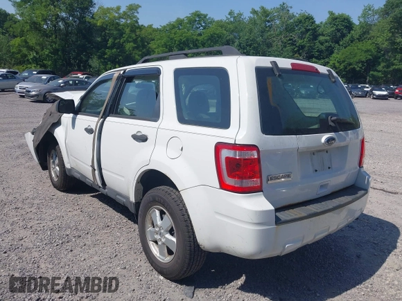 2010 Ford Escape XLS with VIN 1FMCU9C70AKD46856, listed as a IAAI auction lot 42583123 with 125,669 mi miles and . Bid and sale history available at DreamBid. Image 3.