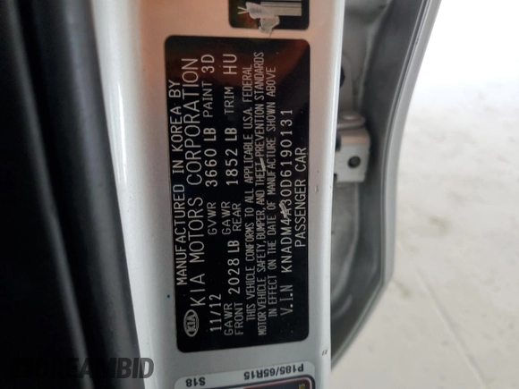 2013 Kia Rio LX z VIN KNADM4A30D6190131, wystawiony jako Copart lot #54657615 z przebiegiem 165 395 mil mil oraz Szkoda całkowita • Salvage title. Historia ofert i sprzedaży dostępna na DreamBid. Obrazek 12.