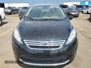 2012 Ford Fiesta SE with VIN 3FADP4BJ3CM118089, listed as a Copart auction lot 68630084 with 49,010 mi miles and Salvage Title. Bid and sale history available at DreamBid. Image 5.