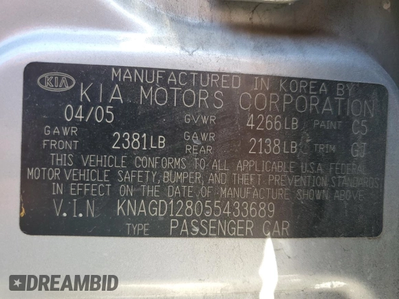 2005 Kia Optima LX z VIN KNAGD128055433689, wystawiony jako Copart lot #46909305 z przebiegiem 27 609 mil mil oraz Szkoda całkowita • Salvage title. Historia ofert i sprzedaży dostępna na DreamBid. Obrazek 12.