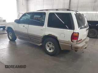 2000 Mercury Mountaineer z VIN 4M2ZU86P7YUJ40690, wystawiony jako IAAI lot #42367495 z przebiegiem 202 988 mil mil oraz . Historia ofert i sprzedaży dostępna na DreamBid. Obrazek 3.