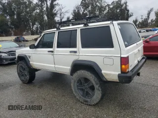 1989 Jeep Cherokee z VIN 1J4FT28LXKL601505, wystawiony jako Copart lot #49312265 z przebiegiem 264 769 mil mil oraz Szkoda całkowita • Salvage title. Historia ofert i sprzedaży dostępna na DreamBid. Obrazek 2.