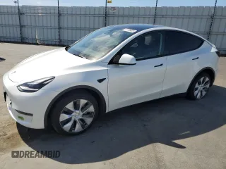 2023 Tesla Model Y Long Range z VIN 7SAYGDEE8PF816544, wystawiony jako Copart lot #57170485 z przebiegiem 74 598 mil mil oraz Szkoda całkowita • Salvage title. Historia ofert i sprzedaży dostępna na DreamBid. Obrazek 1.