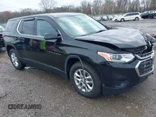 2019 Chevrolet Traverse LS z VIN 1GNERFKW3KJ142931, wystawiony jako IAAI lot #41958389 z przebiegiem 72 373 mil mil oraz . Historia ofert i sprzedaży dostępna na DreamBid. Obrazek 1.