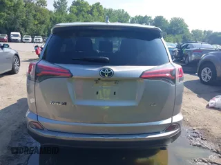 2018 Toyota RAV4 LE with VIN JTMZFREV3JJ161811, listed as a IAAI auction lot 40131640 with 114,330 mi miles. Bid and sale history available at carsss.com. Image 16.