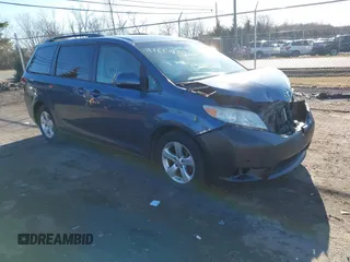 2014 Toyota Sienna LE AAS with VIN 5TDKK3DC4ES514981, listed as a IAAI auction lot 41601188 with 164,963 mi miles. Bid and sale history available at carsss.com. Image 1.