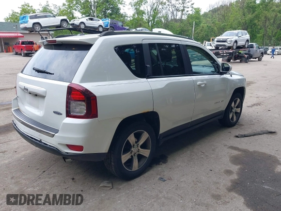 2016 Jeep Compass High Altitude with VIN 1C4NJDEB0GD546305, listed as a IAAI auction lot 42371770 with 158,486 mi miles and . Bid and sale history available at DreamBid. Image 4.