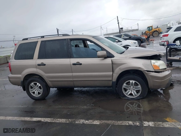 2004 Honda Pilot EX with VIN 2HKYF18604H582741, listed as a IAAI auction lot 41572039 with 225,101 mi miles. Bid and sale history available at carsss.com. Image 13.