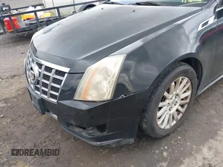 2012 Cadillac CTS with VIN 1G6DC5E52C0116219, listed as a IAAI auction lot 42463440 with 190,818 mi miles and . Bid and sale history available at DreamBid. Image 6.