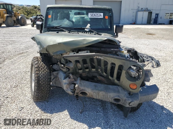 2008 Jeep Wrangler Rubicon z VIN 1J4GA64108L616531, wystawiony jako Copart lot #58363534 z przebiegiem Nie podano mil oraz Szkoda całkowita • Salvage title. Historia ofert i sprzedaży dostępna na DreamBid. Obrazek 5.
