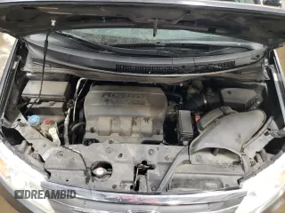2012 Honda Odyssey EX-L with VIN 5FNRL5H69CB143572, listed as a Copart auction lot 48614255 with 114,490 mi miles and Salvage Title. Bid and sale history available at carsss.com. Image 12.