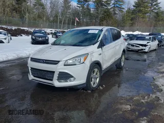 2014 Ford Escape SE with VIN 1FMCU9GX7EUD76778, listed as a IAAI auction lot 41679482 with 136,832 mi miles and . Bid and sale history available at carsss.com. Image 18.